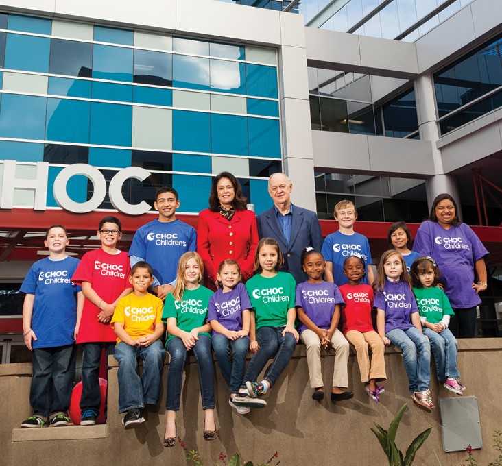 CHOC patients posing with Kim Cripe and Bill Holmes