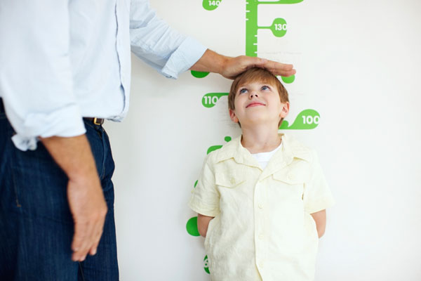 boy height being measured