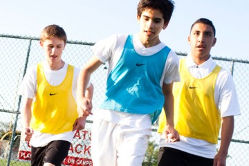 Three boy soccer players