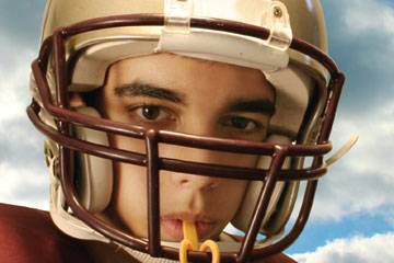 Football player wearing helmet