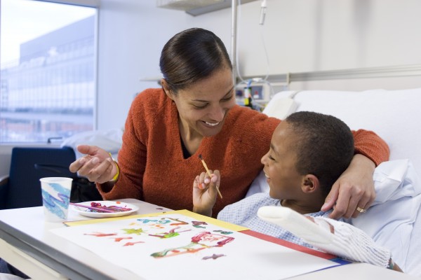 Mother visiting son in the hospital