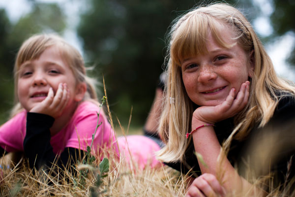 young sisters outside