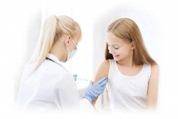 Medical staff giving a young girl a vaccination shot