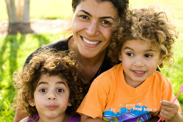 Smiling mom with her children