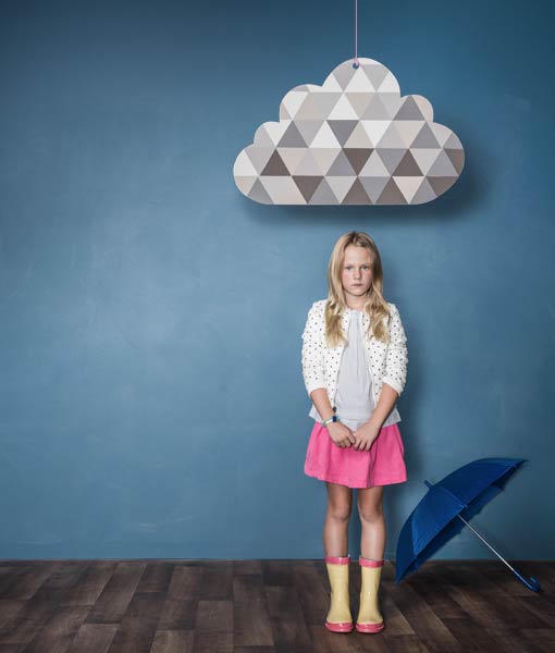 Depression ad - young girl standing under a cloud