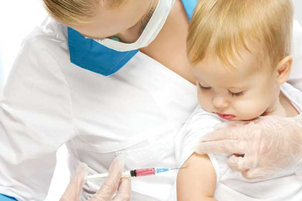 Young child getting his vaccination