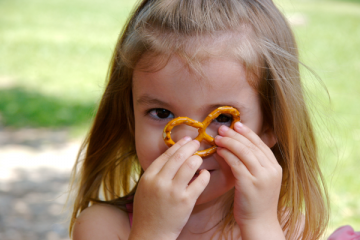 Little girl with snack