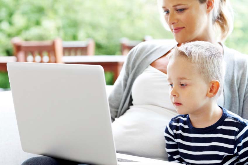 Mom and son looking at computer