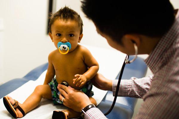 Toddler getting a physical exam