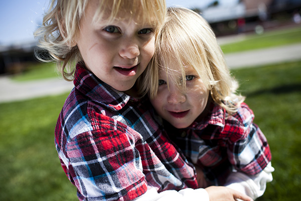 Siblings smiling together