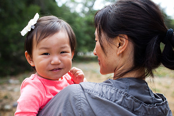 Toddler with mom outside