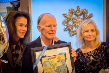 CHOC Children's President and CEO Kimberly Chavalas Cripe, left, with Larry and Chris Laulhere.