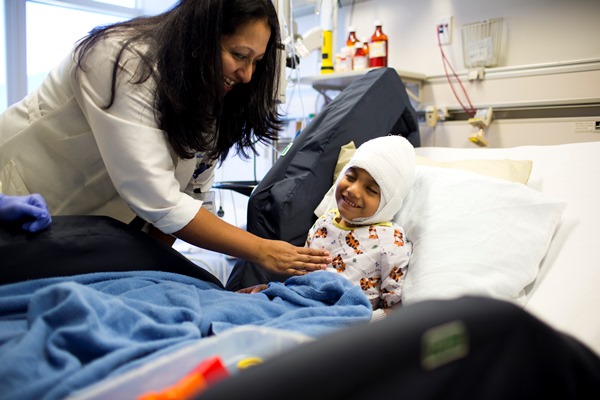 Neurologist checking in on patient