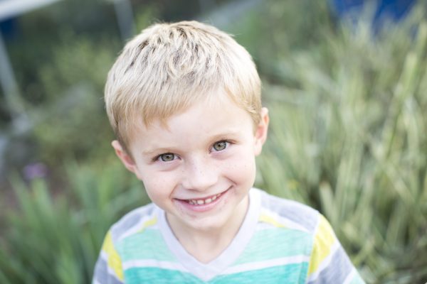 Smiling blond boy