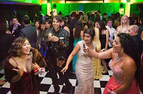 Teens dance at the prom