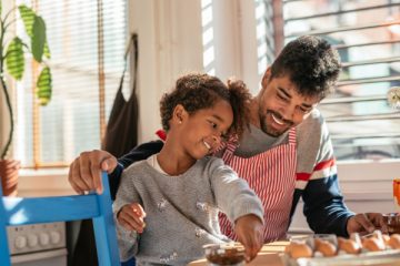 Father and daughter cooking