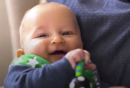 baby boy with toy