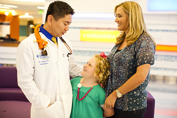 Dr. Richard Chang with patient and her mom