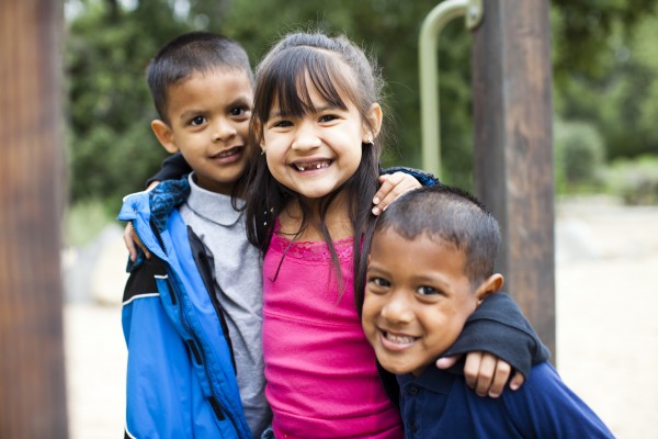 Three kids on the playground