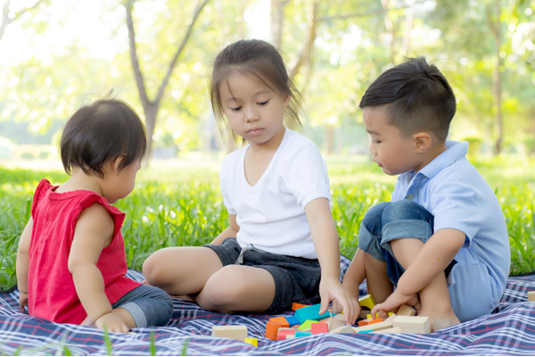 Children in the park having a picnic