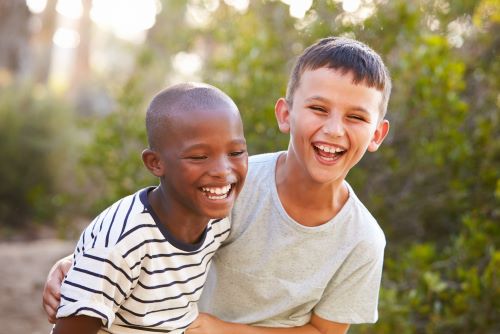 two young boys laughing