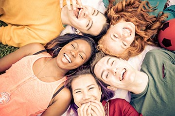 Smiling faces of teens