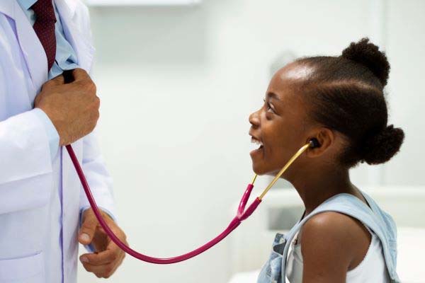 patient listening to doctor's heartbeat