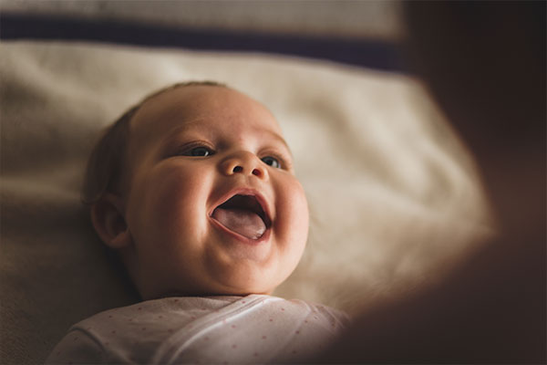 Happy 1-3 month old baby smiling